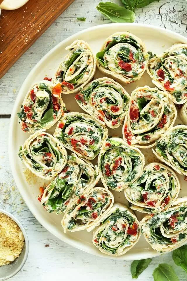 Find easy Game Day appetizers guests love, fast finger foods, crowd favorites, simple prep recipes perfect for parties and playoffs. Sun-Dried Tomato and Basil Pinwheels. Visit https://sharpaspirant.com