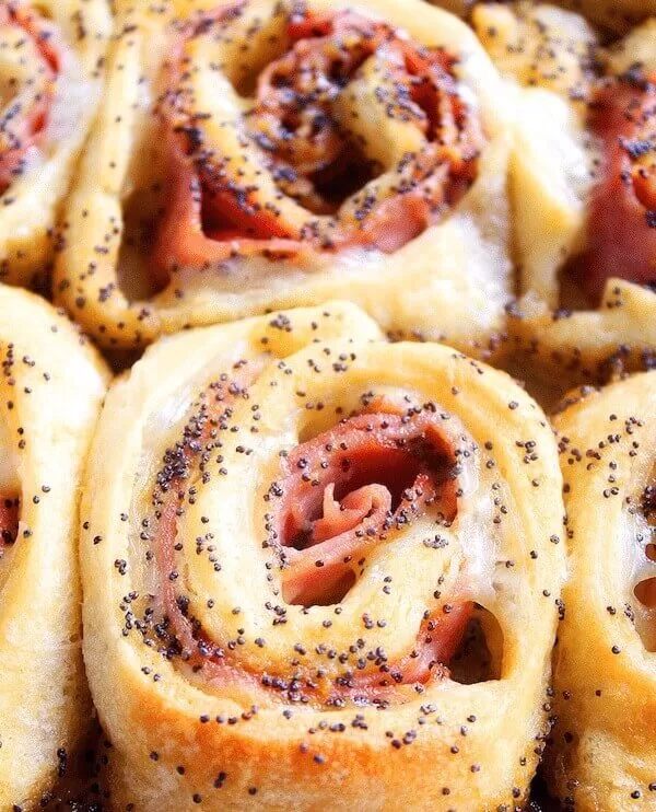 Find easy Game Day appetizers guests love, fast finger foods, crowd favorites, simple prep recipes perfect for parties and playoffs. Baked Ham & Cheese Roll-Ups. Visit https://sharpaspirant.com