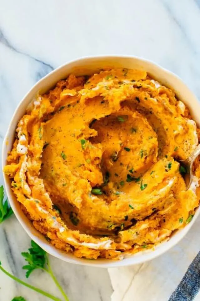 Find 15 sweet potato recipes for Thanksgiving, from creamy casseroles to classic pies, perfect for adding cozy flavor to your feast.