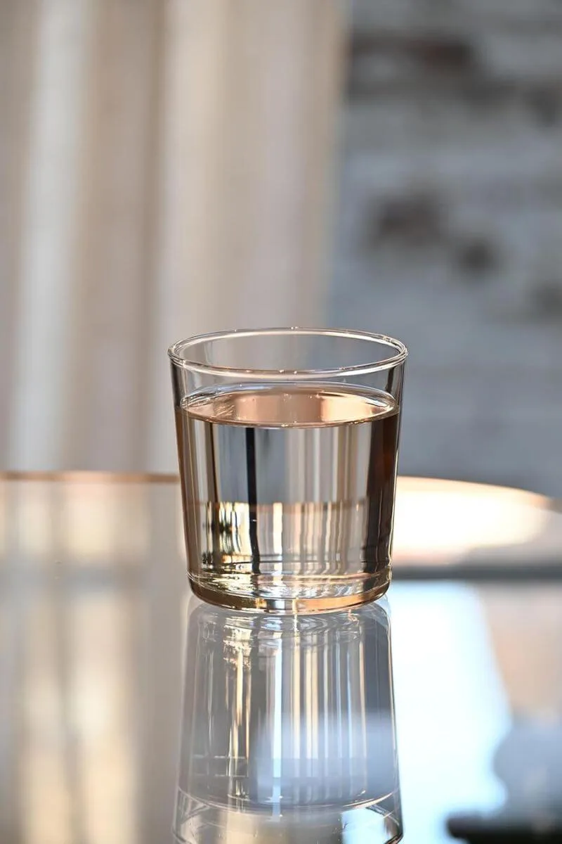 Clear stackable Bormioli Rocco Bodega glasses for a modern minimalist spring tablescape.