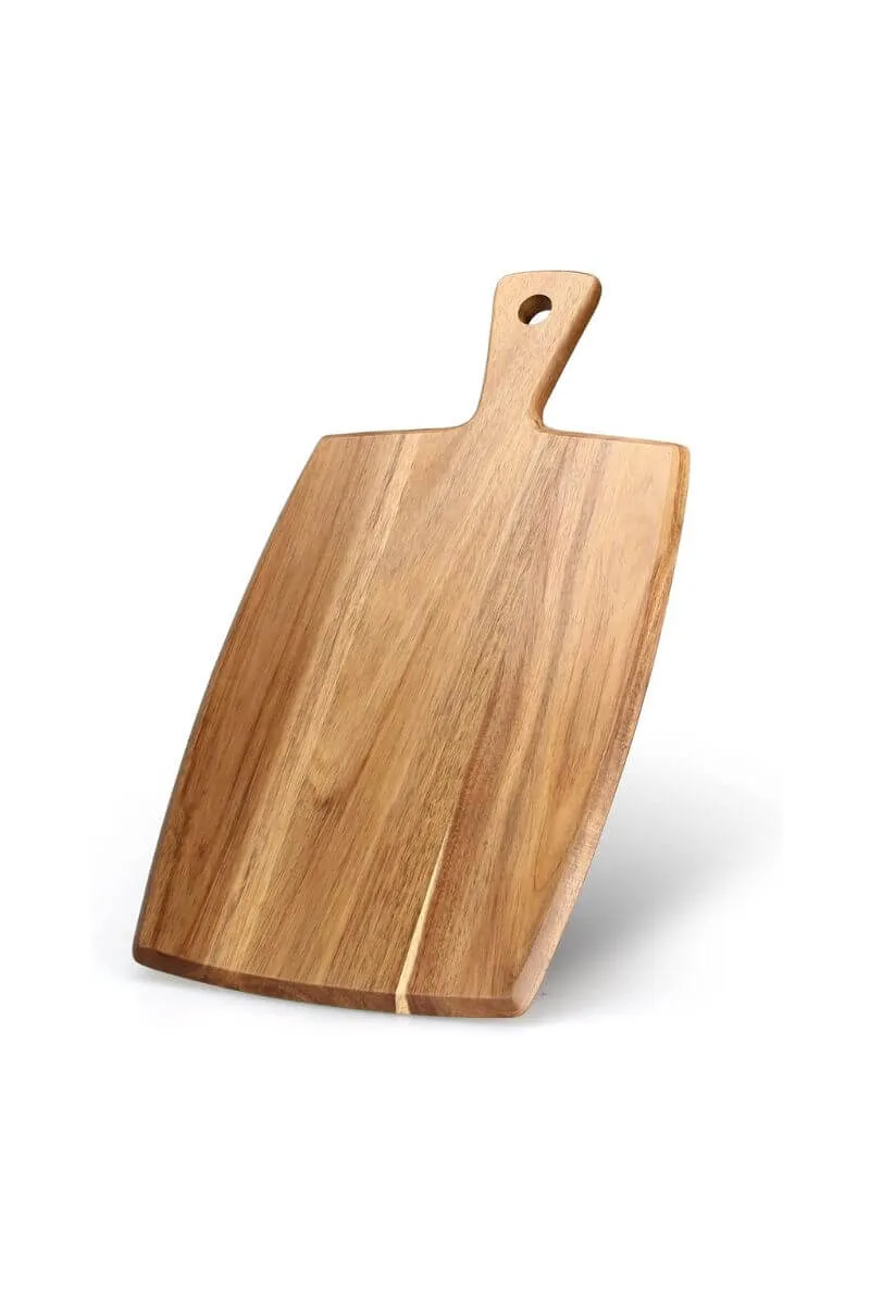 Rectangular acacia wood paddle board with a handle for serving plant-based assemblies and appetizers.